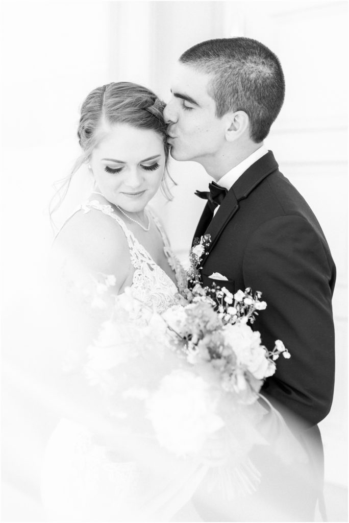 groom kissing bride's temple, harrisburg wedding photographer, abi harte photography 