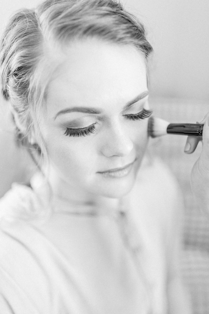 black and white image of bridal makeup