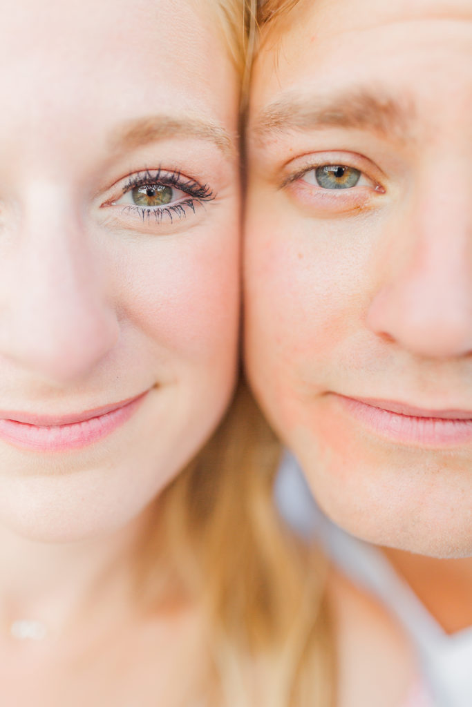 close up photo of couple, green eyes