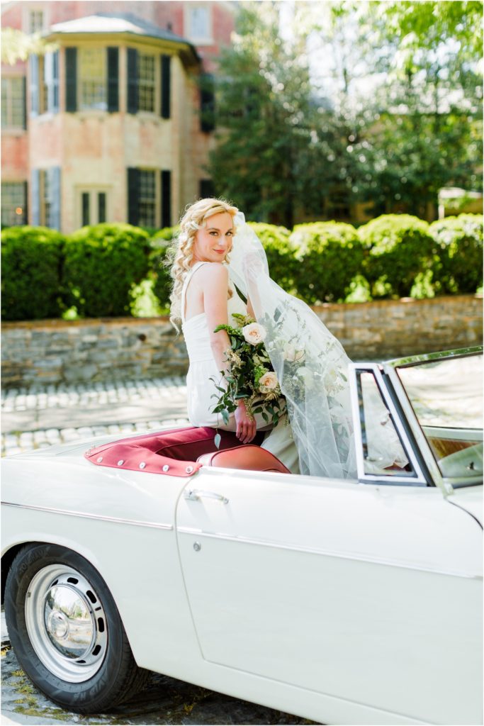 bride on a vintage car