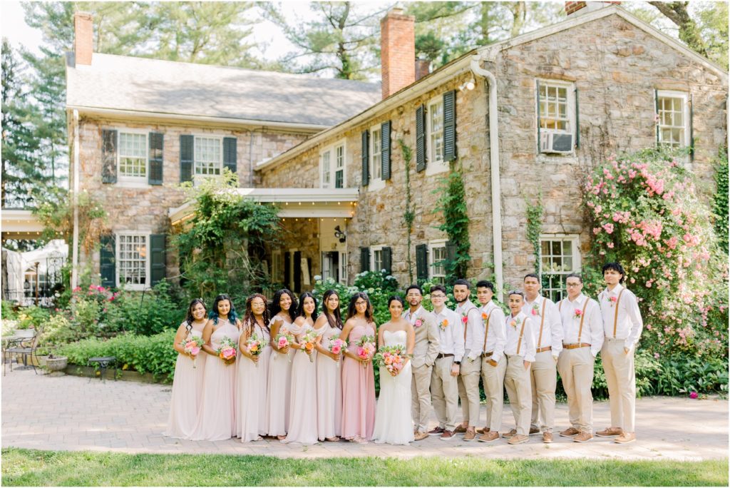 Wedding Party portraits by the stone cottage