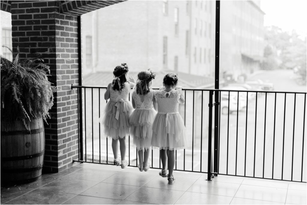 little girls looking out window